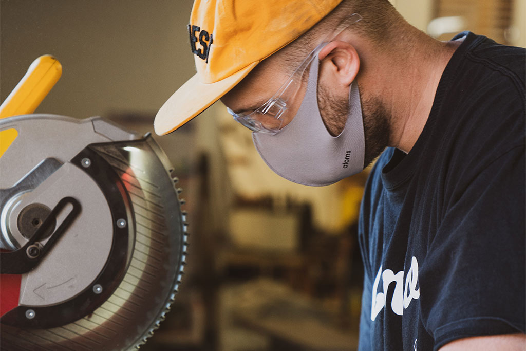 nJoy Vision Workplace Eye Wellness Month Blog Post Feature Image of machinery operator wearing protective eyewear