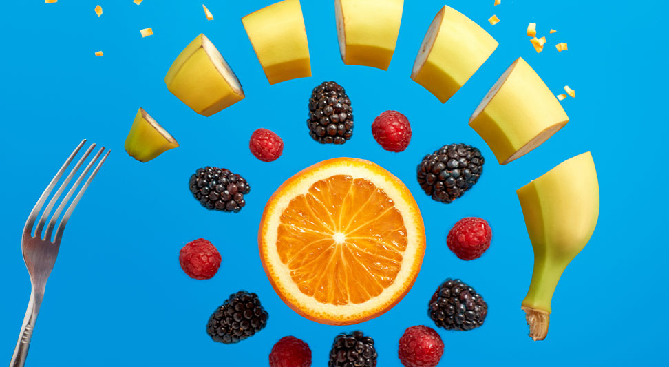nJoy Vision 10 Healthy Foods for Healthy Eyes blog image of fruits in a circular pattern