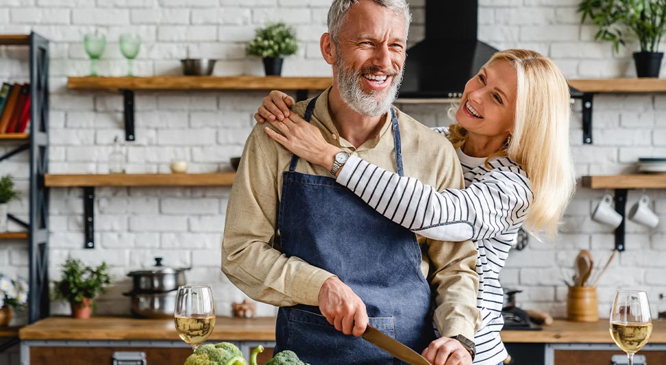 nJoy Vision LASIK alternatives blog post story image of a happy older couple preparing food in the kitchen
